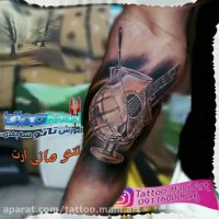 تتو سه بعدی لیوان و گیتار روی بازو