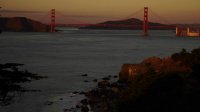 Timelapse: Container Ships Under Golden Gate Bridge at Sunset, San Francisco, California, US