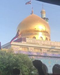 مراسم تعویض پرچم گنبد حرم حضرت زینب (س)