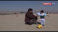 پیراهن امضاشده مسی بر تن کودک افغان