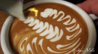 Barista Dritan Alsela shows Latte Art