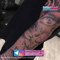 تتو شیر و چشم روی بازو و ساعد