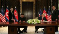 لحظه امضای سند مشترک بین آمریکا و کره شمالی