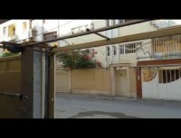 درب اتوماتیک ریلی  ساختمان آقای هرندی خیابان باغ فردوس