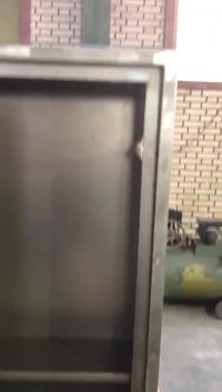 تست درب جعبه آتشنشانی تلق خور لولا مخفی با قفل مگنتی تولید شده توسط شرکت پارس فرابخش انرژی