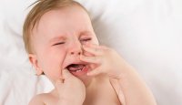 چطور نوزادی را که در حال دندان در آوردن است، مدیریت کنیم؟