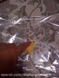 عروسک ماساژی مخصوص پشت موبایل و تبلت