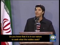 Young Bahraini activist recites a poem at a meeting with Leader