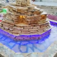 اجرای آبنما و آبشار برکه جوب باسنگهای کوهی مالون لاشه طبیعی در محوطه ویلا باغ