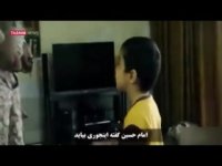 لحظه وداع شهید مدافع حرم با فرزندش