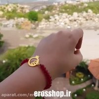 دستبند مهره کریستال یاقوتی همراه با پلاک استیل طلایی طرح انار